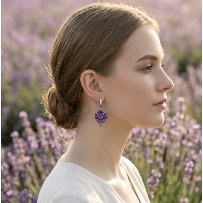 Lavender Beauty authentic 12.2 carat Amethyst .925 Sterling Silver dipped in rhodium handcrafted earrings - Side view of Lavender Beauty Amethyst earrings worn in lavender field.