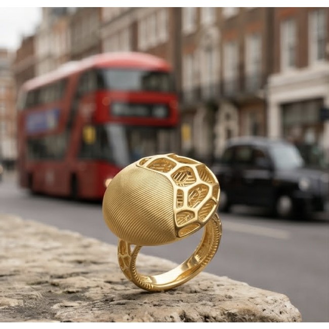 Dubai Style .925 Sterling Silver dipped in 22K Gold handmade Large ring size 7 1/4 - Gold-plated ring close-up with geometric design, urban background
