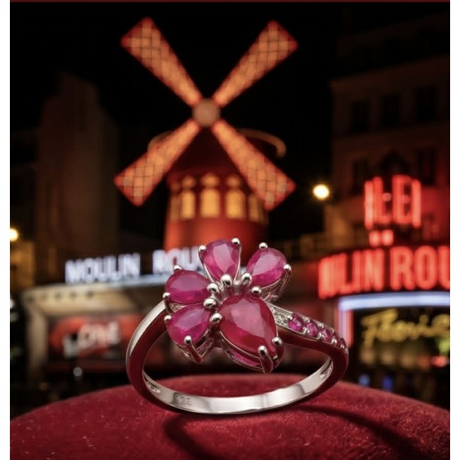 Stella - 6.9 carat Ruby .925 Sterling Silver handcrafted incredible ring s. 8 - Ruby ring close-up on red velvet, Moulin Rouge windmill in background.