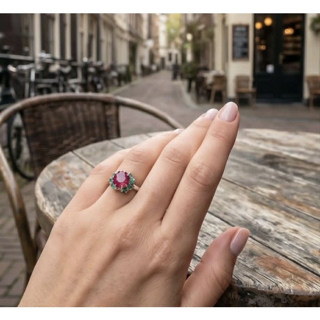 Authentic 5.2 carat Mozambique Ruby .925 Sterling Silver brilliantly handcrafted ring s. 9 - Ruby ring on hand, outdoor setting, showing front view of the stone.