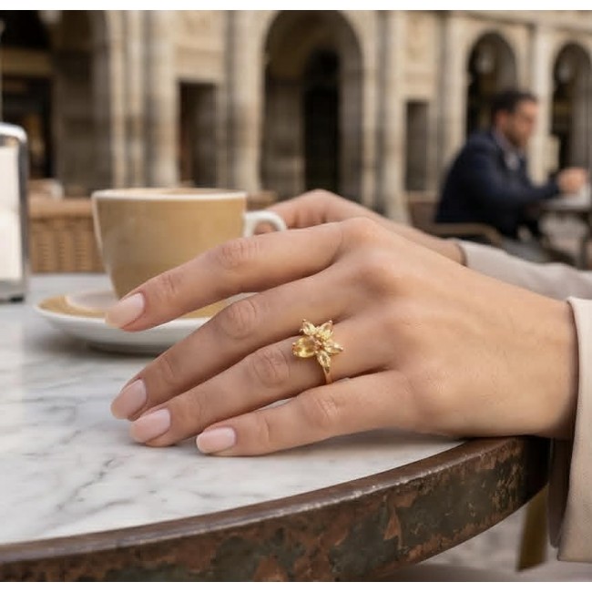 Golden Treasure 8.5 carat Brazilian Citrine 18K Gold over .925 Sterling Silver Handcrafted Ring size 8 - Citrine ring worn on hand at a cafe table.