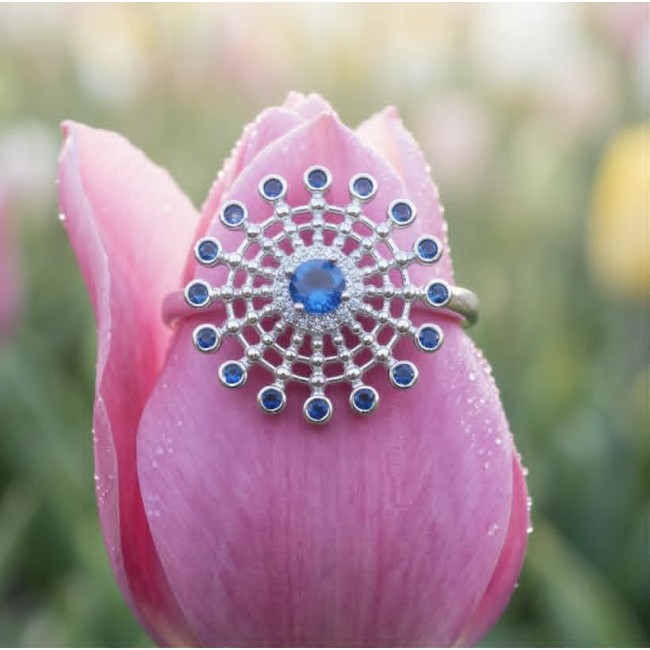 Star 2.2 carat natural Sapphire .925 Sterling Silver Perfectly handcrafted Ring s. 7 - Sapphire ring on a pink tulip, top view showing intricate design.