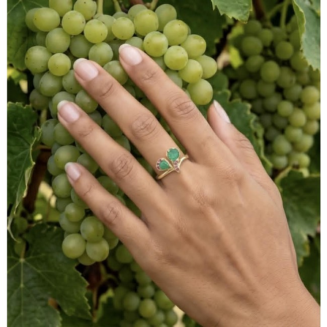 Gabriella 2.7 carat authentic Emerald 18K Gold over .925 Sterling Silver handcrafted Statement Ring size 8 - Hand wearing Gabriella 2.7 carat emerald ring near green grapes