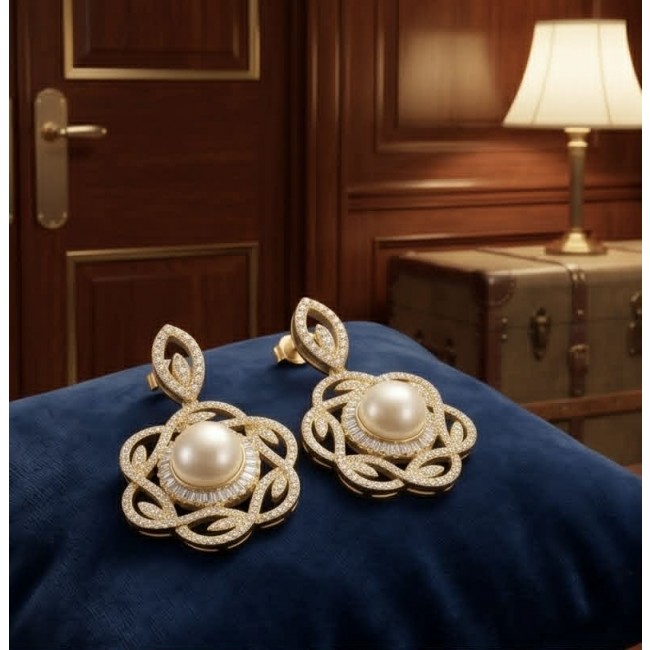 Sublime natural Pearl White Sapphire 18K Gold over .925 Sterling Silver handcrafted Earrings - Elegant pearl and sapphire earrings on blue velvet, front view.