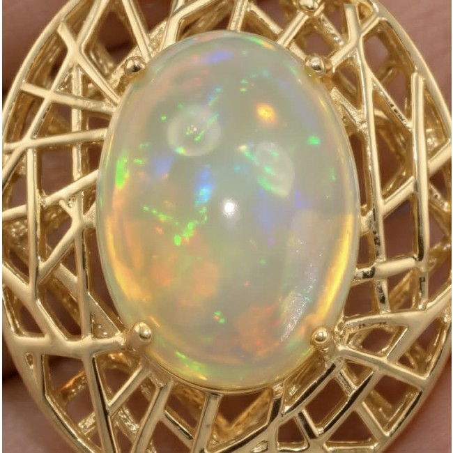 Earth Treasure Authentic 16.8 carat Golden Ethiopian Opal 22K Gold over .925 Sterling Silver handcrafted Statament Necklace - Close-up of 16.8 carat Golden Ethiopian Opal set in gold.