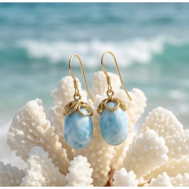 Genuine 10.5 carat Blue Larimar 14K Gold over .925 Sterling Silver handmade earrings - Blue Larimar earrings on coral, front view, 14K gold over sterling silver