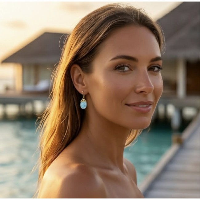 Genuine 10.5 carat Blue Larimar 14K Gold over .925 Sterling Silver handmade earrings - Side view of Blue Larimar earrings worn, with 14K Gold over Sterling Silver.