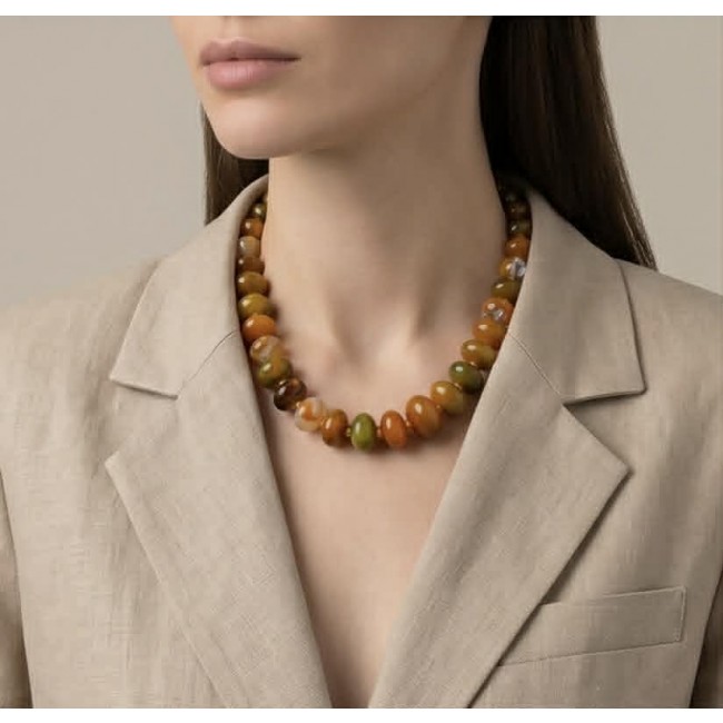 Top quality Rare Unusual Natural Mookiate .925 Sterling Silver Necklace - Mookaite necklace worn, front view, beige blazer backdrop.
