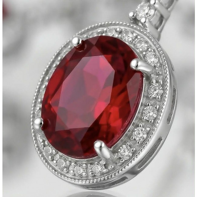 Clarissa - authentic 27.4 carat Ruby .925 Sterling Silver dipped in rhodium handcrafted Statement earrings - Close-up of 27.4 carat ruby in .925 sterling silver setting.