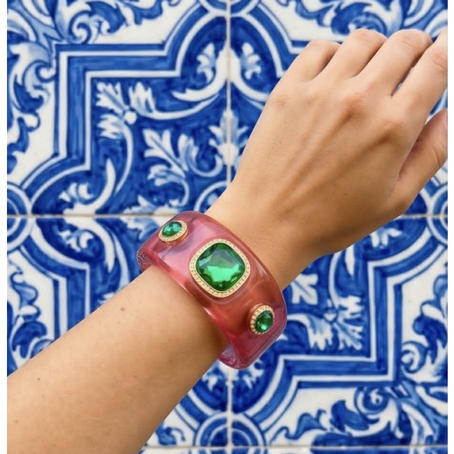 Candy Store - Modern Design Natural Pink Raisin Peridot .925 Sterling Silver bracelet - Pink resin bracelet with green gems, worn on wrist, blue tile background.
