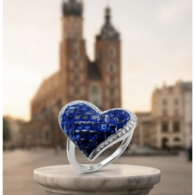 Pure Heart 12.2 carat natural Sapphire .925 Sterling Silver Perfectly handcrafted Ring s. 7 - Heart-shaped sapphire ring in close-up on marble stand, blurred city background.