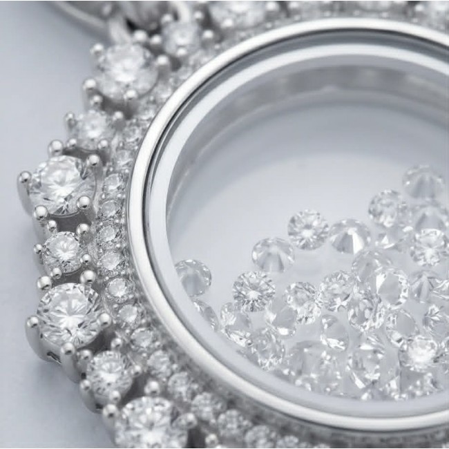Floating Memories 12.5 carat White Sapphire .925 Sterling Silver Handcrafted Statement pendant - Close-up of Floating Memories 12.5 carat White Sapphire necklace.