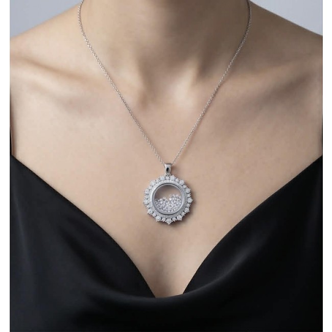 Floating Memories 12.5 carat White Sapphire .925 Sterling Silver Handcrafted Statement pendant - Necklace with circular pendant worn on model, front view.