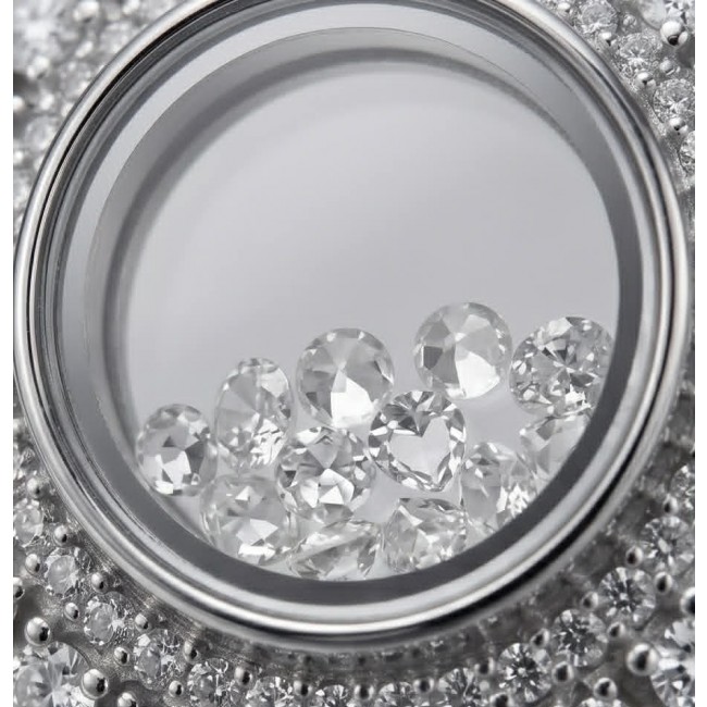 Floating Memories 10.5 carat White Sapphire .925 Sterling Silver Handcrafted Ring size 9 - Close-up of Floating Memories white sapphire in sterling silver setting.