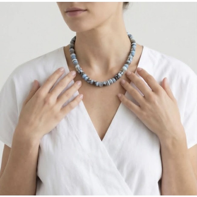 Rare and Spectacular 225.9 carat authentic Andean (Peruvian) Blue Opal .925 Sterling Silver Handcrafted necklace - Necklace worn, front view, featuring Peruvian stones on white blouse.