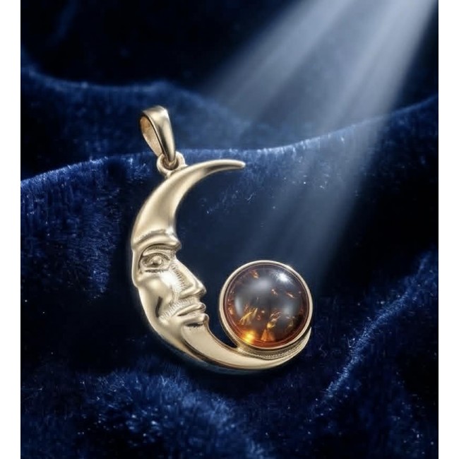 Golden Moon Prehistoric Authentic Baltic Amber 18K Gold over .925 Sterling Silver beautifully handcrafted Pendant - Moon amber pendant on blue velvet, side view with light beam.