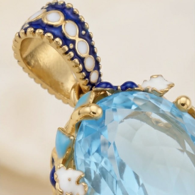 Atlantica 34.4 carat fancy oval cut Swiss Blue Topaz 18K Gold over Enamel .925 Sterling Silver handcrafted Handcrafted Pendant - Close-up of Atlantica Swiss Blue Topaz pendant with decorative loop.