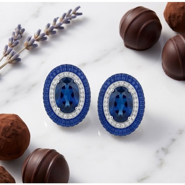 Art Deco - Incredible genuine 10.5 CARAT Sapphire .925 Sterling Silver handcrafted Earrings - Sapphire earrings front view with chocolates on marble surface.