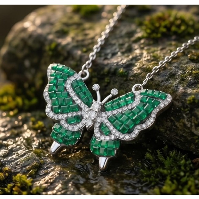 Precious Butterfly authentic 12.9 carat Colombian Emerald .925 Sterling Silver handcrafted Statement necklace - Butterfly necklace with emeralds and diamonds on a mossy rock close-up.