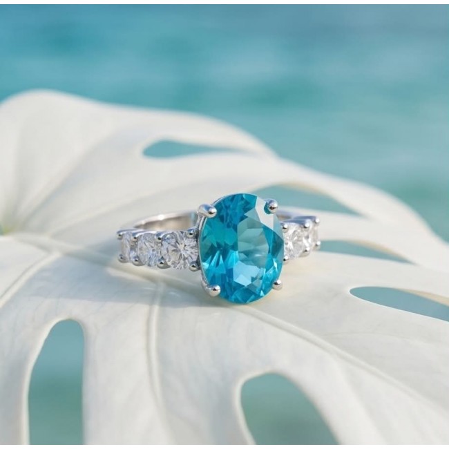 Eau Pure 5.1 carat Paraiba Tourmaline .925 Sterling Silver Handcrafted Ring size 8 adjustable - Paraiba Tourmaline ring close-up on leaf, ocean background