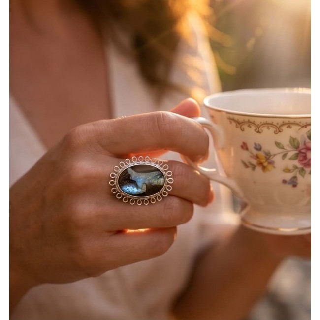 Australian Boulder Opal .925 Sterling Silver handcrafted Large ring size 7 1/4 - Boulder Opal ring worn on hand holding floral teacup in sunlight.