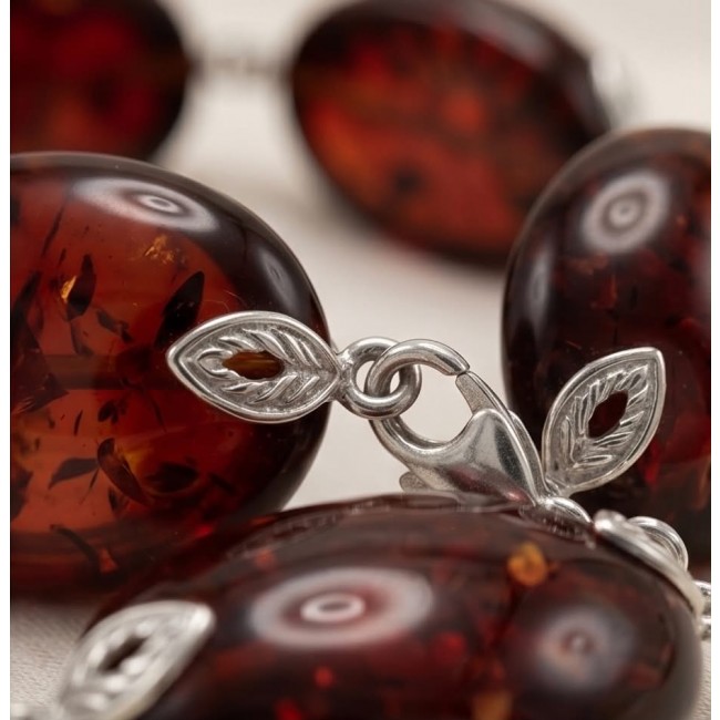 Excellent quality Cognac color Baltic Amber .925 Sterling Silver entirely handcrafted Bracelet - Clasp detail of Cognac Baltic Amber with .925 Sterling Silver leaves.