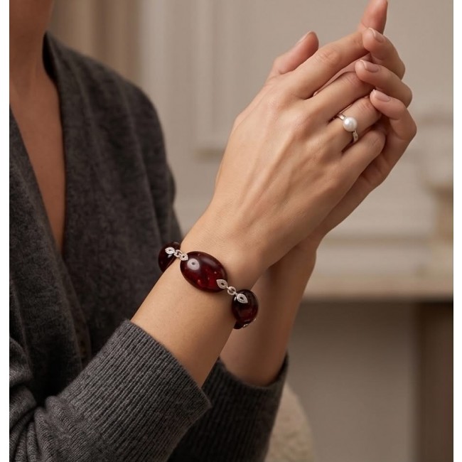 Excellent quality Cognac color Baltic Amber .925 Sterling Silver entirely handcrafted Bracelet - Worn on hand: Cognac Baltic Amber bracelet with sterling silver.