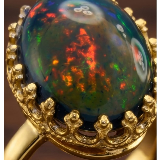 Exotic Beauty Genuine 24.2 carat Black Opal 18K Gold over .925 Sterling Silver handmade Ring size 8 1/4 - Close-up of Exotic Beauty 24.2 carat Black Opal in 18K gold setting.