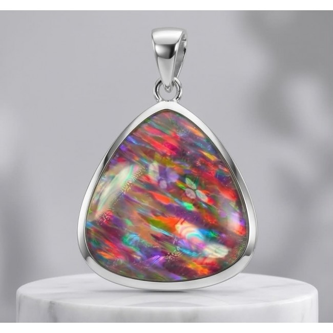 Kaleidopscop 19.5 carat Australian Doublet Opal .925 Sterling Silver handcrafted pendant - Close-up of Kaleidoscope 19.5 carat Australian Doublet Opal pendant.