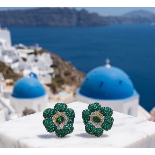 Born to Glam authentic 20.2 carat Colombian Emerald .925 Sterling Silver handcrafted earrings - Emerald flower earrings with Santorini backdrop.