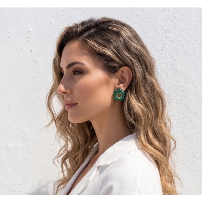 Born to Glam authentic 20.2 carat Colombian Emerald .925 Sterling Silver handcrafted earrings - Side view of woman wearing Born to Glam emerald earrings.