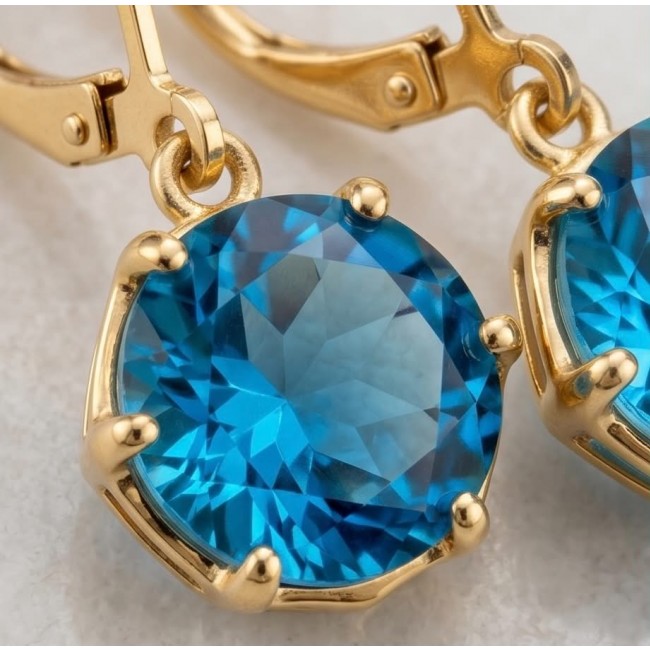 Atlantica 6.8 carat Swiss Blue Topaz 22K Gold over .925 Sterling Silver Handcrafted Statement earrings - Close-up of Swiss Blue Topaz in 22K gold over silver setting.