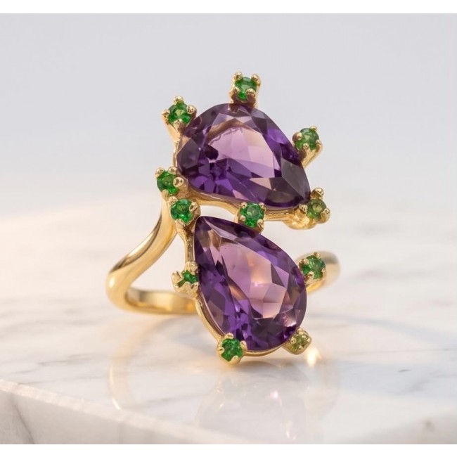 Purple Royalty 8.5 carat Amethyst .925 Sterling Silver dipped in 18K Gold over Handcrafted Ring size 6 1/4 - Close-up of double teardrop amethyst ring with green accents on marble.