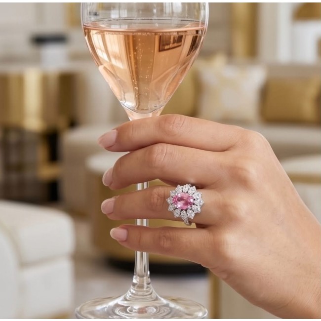 Anastasia 5.2 carat Pink Sapphire .925 Sterling Silver Handcrafted Statement Ring size 5 - Hand wearing Anastasia pink sapphire ring holding a glass of champagne.