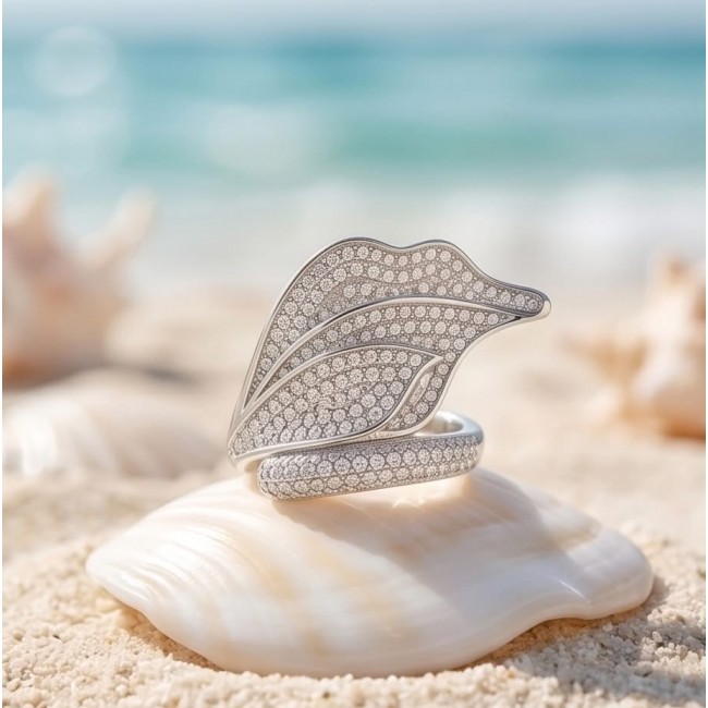 Luxurious Silver Leaf 3.8 carat White Topaz .925 Sterling Silver Solid ring size 8 - Silver leaf ring with white topaz on seashell near beach, side view.