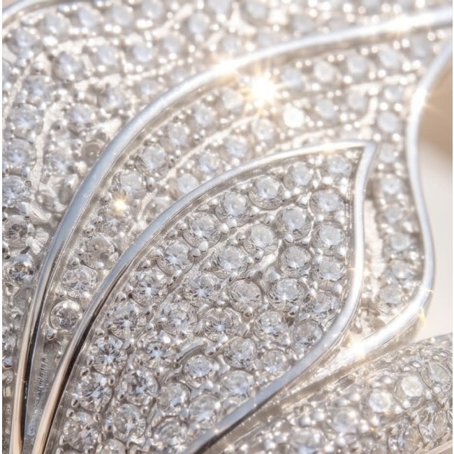 Luxurious Silver Leaf 3.8 carat White Topaz .925 Sterling Silver Solid ring size 8 - Close-up of silver leaf jewelry featuring white topaz stones.
