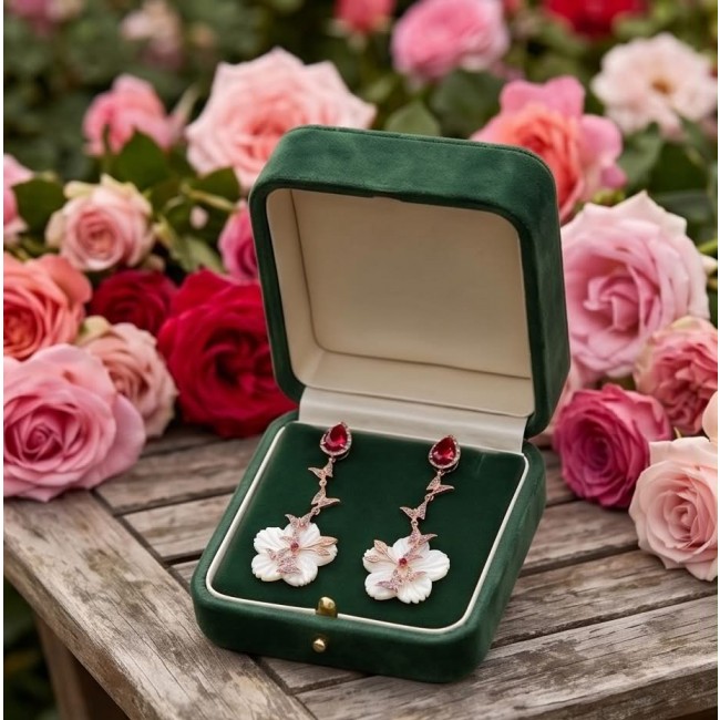 Summer Flowers Blister Pearl Red Topaz 18K Rose Gold over .925 Sterling Silver handcrafted Earrings - Earrings in green box among roses, top view, pearl and red topaz detail.