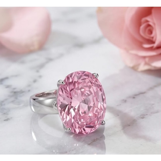 Tiffany - authentic 14.5 carat Pink Sapphire .925 Sterling Silver Handcrafted Statement Ring size 8 - Close-up of 14.5 carat pink sapphire ring on marble with pink roses.
