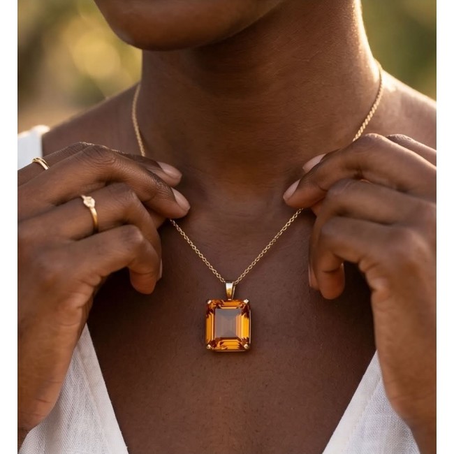 Luxury genuine 33.5 CARAT assher cut Champagne Topaz .925 Sterling Silver dipped in 18K Gold handmade Pendant - Close-up of asscher cut Champagne Topaz necklace being worn