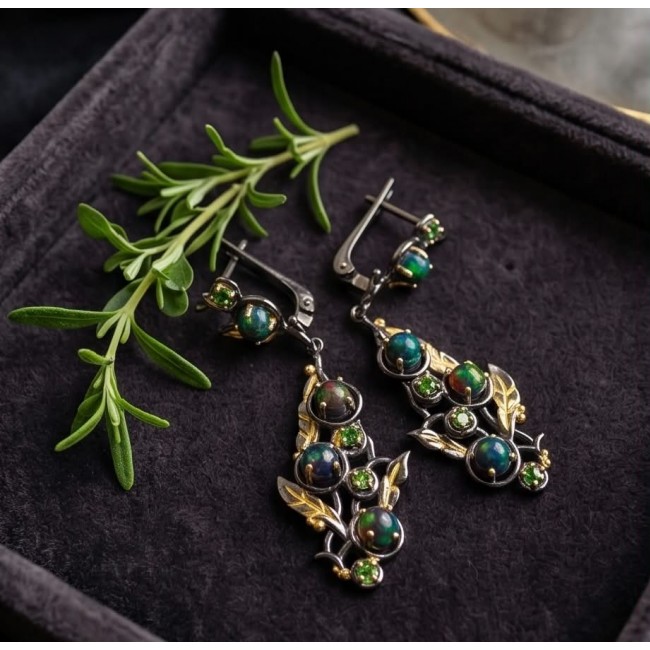 CAROLYN 4.2 carat Australian Black Opal black rhodium 18K Gold over .925 Sterling Silver incredible handcrafted Earrings - Close-up of CAROLYN earrings with black opal and greenery accent.