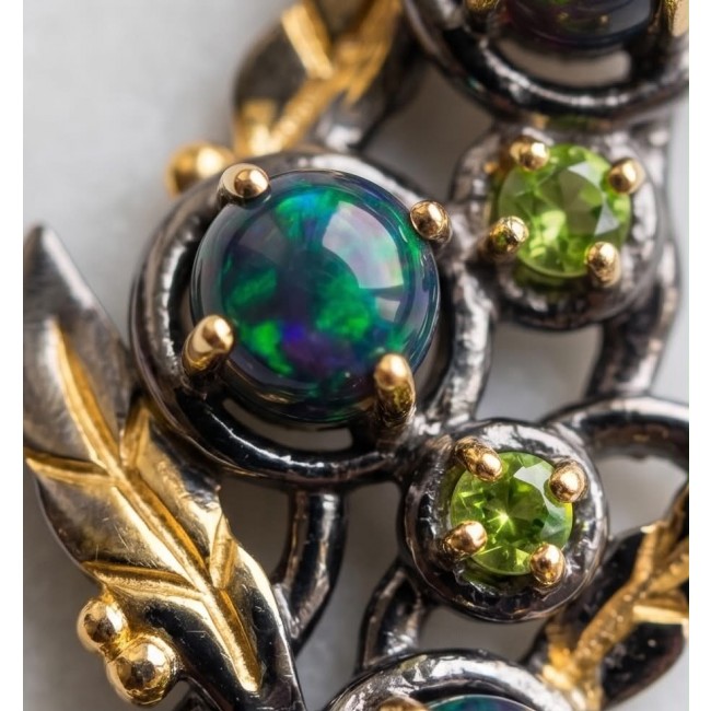 CAROLYN 4.2 carat Australian Black Opal black rhodium 18K Gold over .925 Sterling Silver incredible handcrafted Earrings - Close-up of black opal and green gemstones in ornate setting.