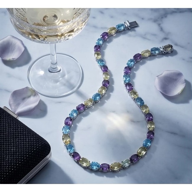 Pastel Royalty - 205.8 carat Natural Multigem .925 Sterling Silver Handcrafted Statement Necklace - Multigem necklace with wine glass and petals on marble background.