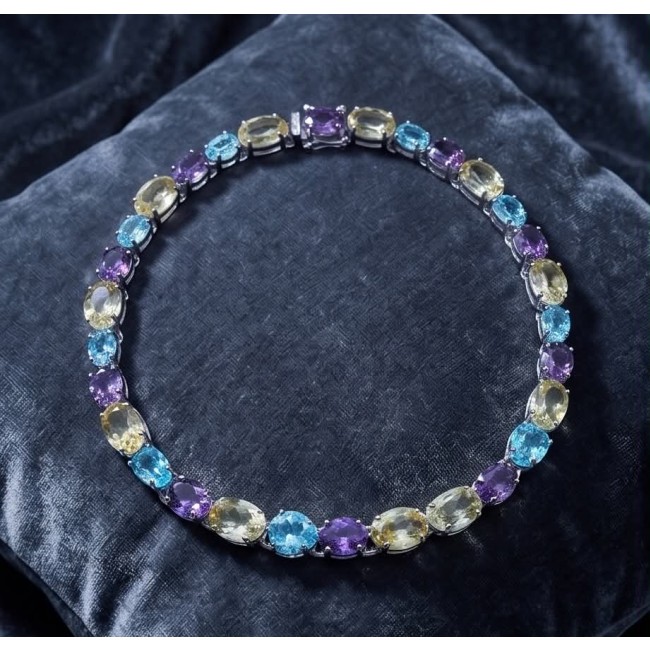 Pastel Royalty - 205.8 carat Natural Multigem .925 Sterling Silver Handcrafted Statement Necklace - Multigem necklace on fabric background, top-down view