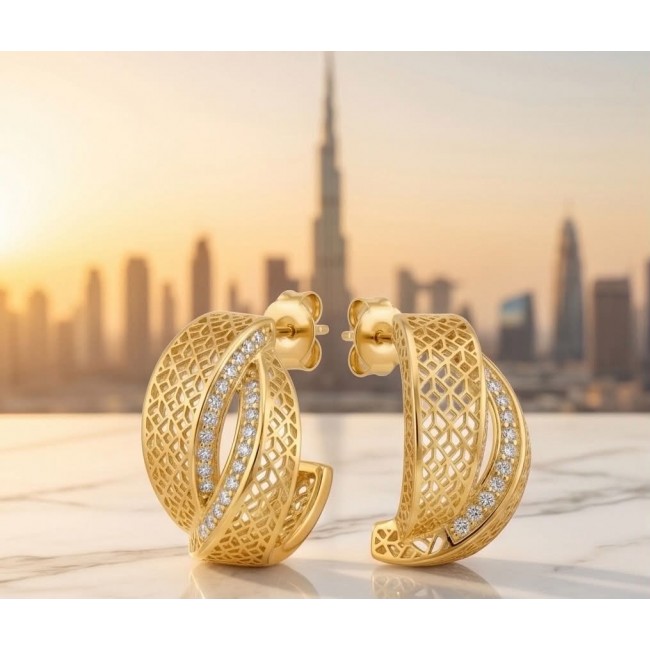 Dubai Style - .925 Sterling Silver dipped in 22K Gold handmade Large Earrings - Gold earrings with diamond accents, Dubai skyline background, side view.