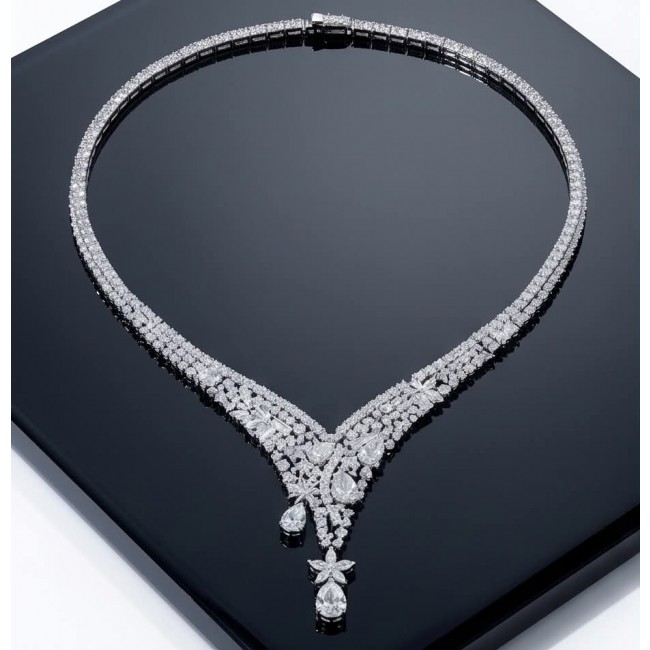 Veronica - Precious 35.5 carta White Topaz rhodium over .925 Sterling Silver .925 Sterling Silver Statement Necklace - Necklace on black surface, full view, white topaz, rhodium finish.