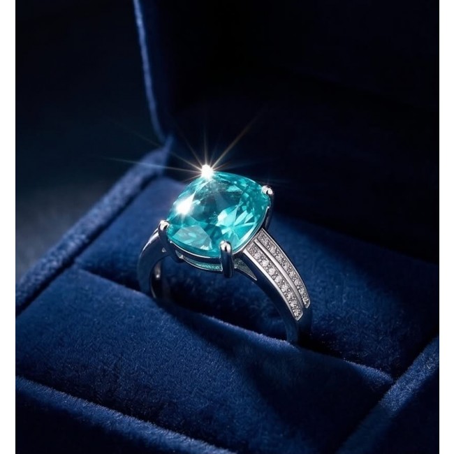 Eau Pure 8.2 carat Paraiba Tourmaline .925 Sterling Silver Handcrafted Ring size 8 adjustable - Paraiba Tourmaline ring close-up in blue velvet box.
