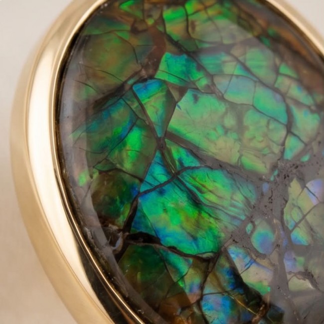 Sublime Aura Canadian Fire Ammolite 14K Gold over .925 Sterling Silver handmade earrings - Close-up of Sublime Aura Canadian Fire Ammolite set in 14K gold.