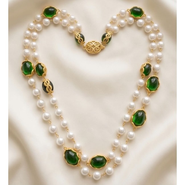 Incredible 48 inches long Freshwater Pearl 10K Gold over .925 Sterling Silver handmade Necklace - Pearl and green stone necklace with gold details, arranged on fabric.