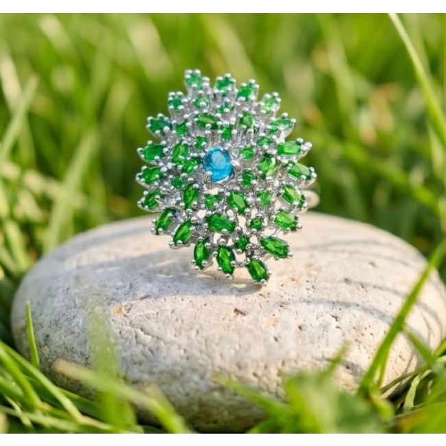 Fiammetta oval cut 2.2 carat Paraiba Tourmaline Tsavorite Garnet .925 Sterling Silver entirely handmade Ring size 8 - Close-up of Fiammetta ring with Paraiba Tourmaline and Tsavorites on stone.
