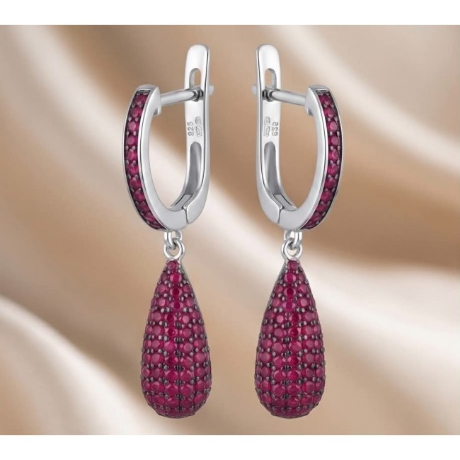 Giovanna Natural 20.2 carat Kasmir Ruby .925 Sterling Silver handcrafted Statement earrings - Silver earrings with Kasmir ruby teardrops, front view.